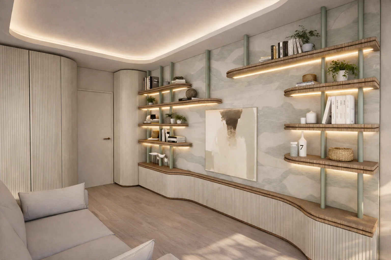 Bibliothèque sur mesure de l’appartement Gallia à Cannes avec étagères lumineuses, lignes arrondies et rangement architectural réalisé par Intérieurs à Croquer.