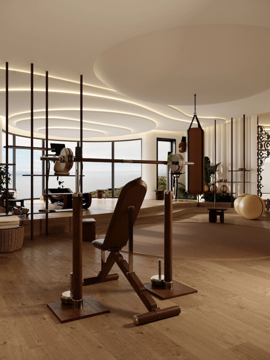 Espace fitness privé à Monaco avec banc de musculation design, matériaux nobles, lumière sculptée et architecture intérieure haut de gamme.