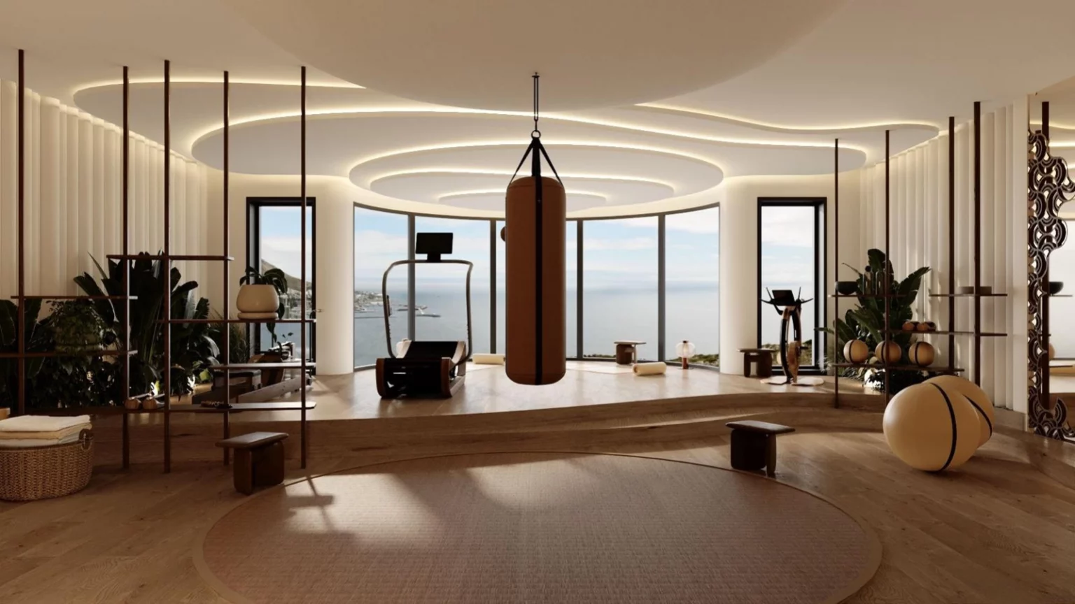 conception d'un espace fitness privé à Monaco avec vue mer, architecture intérieure sur mesure, salle de sport haut de gamme, lignes courbes et ambiance bien-être.